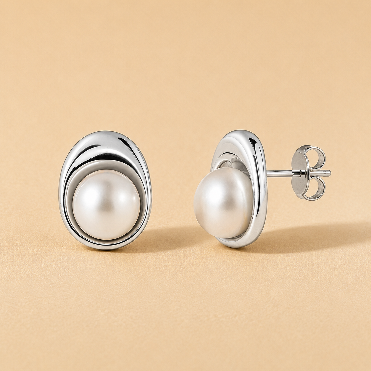 Oval Bezel Pearl Studs