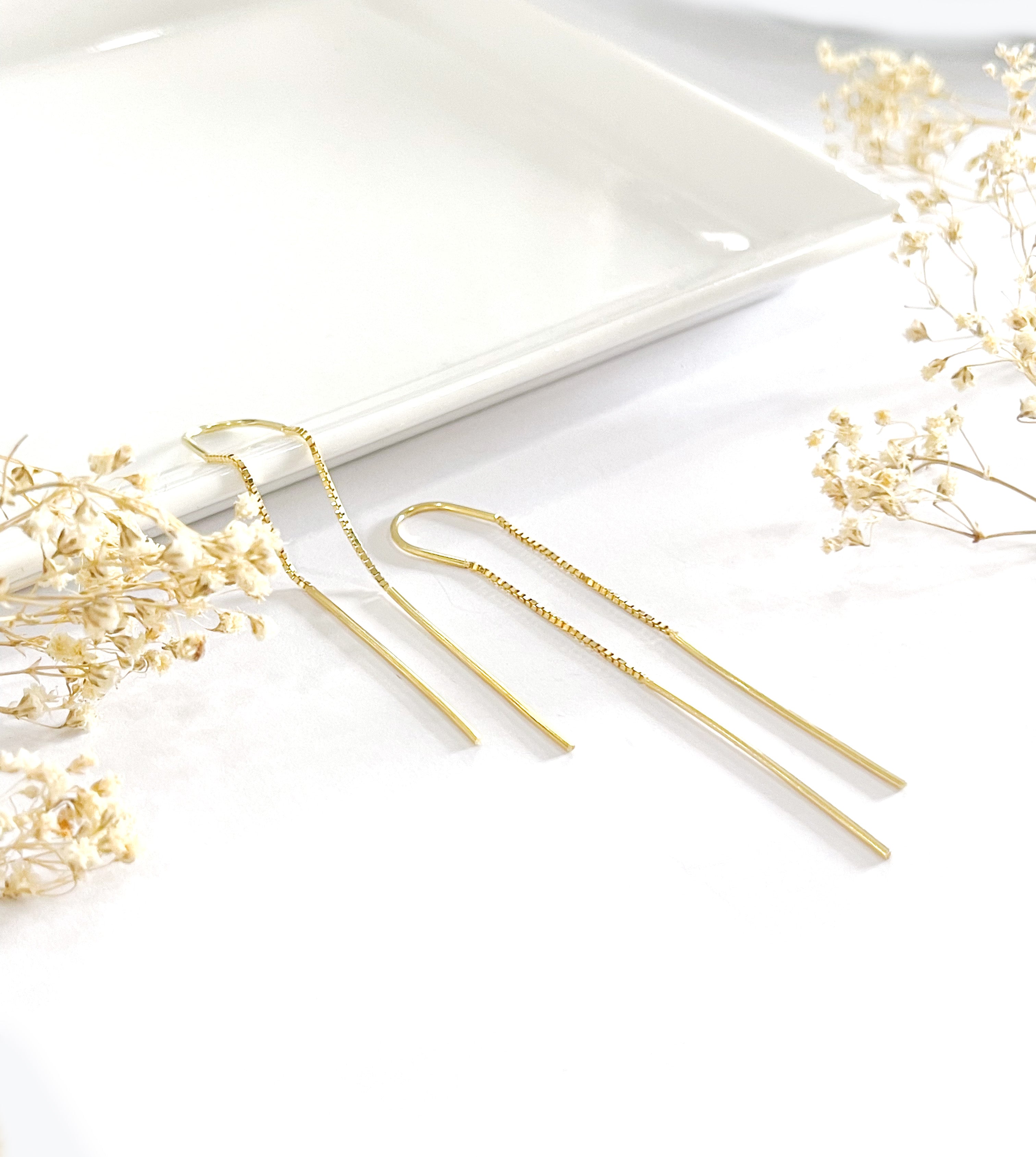 Buy Pearl embellished needle thread earrings by MNSH at Aashni and Co